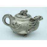 A Chinese white metal dragon Tea pot 17 x 9cm (2).