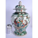 A LARGE 19TH CENTURY CHINESE FAMILLE VERTE PORCELAIN VASE AND COVER Qing, Kangxi style, painted with