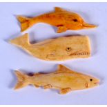 THREE CHINESE CARVED BONE FISH 20th Century, possibly lures. 5.5 cm wide. (3)