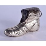 AN ANTIQUE SILVER BOOT PIN CUSHION. 34 grams. 7.5 cm x 5 cm.