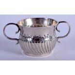 A RARE 18TH/19TH CENTURY MINIATURE SILVER TWIN HANDLED MUG. 22 grams. 6.5 cm x 3 cm.