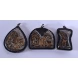 THREE EARLY 20TH CENTURY TIBETAN SILVER AND POTTERY ICONS. 5.5 cm x 3.5 cm.