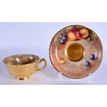 Royal Worcester teacup and saucer painted with fruit by John Cook, signed, date 1978 or later. Cup