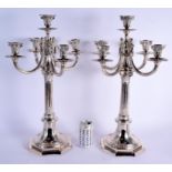 A LARGE ARTS AND CRAFTS SILVER CANDELABRA decorated with motifs. 3180 kgs. 59 cm x 37 cm.