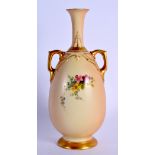 Royal Worcester two handled vase painted with flowers on a blush ivory ground, date code 1910, shape