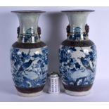 A LARGE PAIR OF 19TH CENTURY CHINESE BLUE AND WHITE CRACKLE GLAZED VASES Late Qing, painted with bir