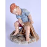 Late 19th c. Royal Worcester rare model of a young boy with a fishing net impressed and registration