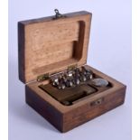 A CASE VINTAGE WEIGHTS SET. 10 cm x 6 cm.