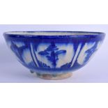 AN EARLY 20TH CENTURY ISLAMIC PERSIAN BLUE AND WHITE POTTERY BOWL painted with motifs. 19 cm wide.