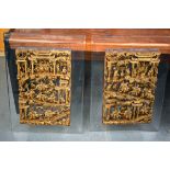 A LARGE PAIR OF 19TH CENTURY CHINESE CARVED WOOD TEMPLE PANELS Qing, depicting battle scenes. Wood 6