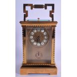 A CONTEMPORARY BRONZE REPEATING CARRIAGE CLOCK. 20 cm high inc handle.