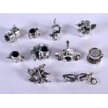 TEN SILVER CHARMS. 30 grams. 1 cm x 1 cm. (6)