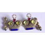 A PAIR OF CONTINENTAL SILVER JEWELLED ENAMEL CROWN CUFFLINKS. 2.75 cm wide.