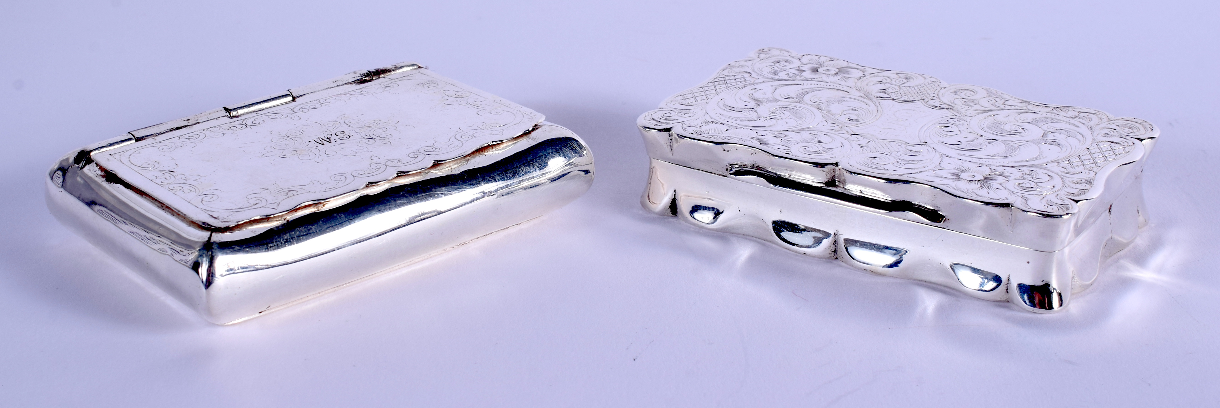 TWO ANTIQUE WHITE METAL SNUFF BOXES. Largest 8 cm x 5 cm. (2)