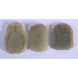 THREE CHINESE CARVED JADE PLAQUE PENDANTS 20th Century, in various forms and sizes. Largest 5 cm x 5