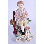 18th c. Derby figure of a boy huntsman seated beside a dog, patch marks. 12.5cm high