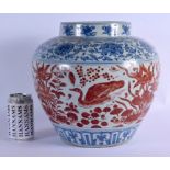 A VERY LARGE CHINESE QING DYNASTY BLUE AND WHITE VASE Ming style, painted with red ducks and extensi