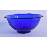 A FINE 19TH CENTURY CHINESE PEKING BLUE GLASS BOWL Qing, of octagonal form. 12 cm wide.