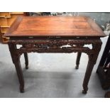 A FINE 19TH CENTURY CHINESE CARVED HONGMU HARDWOOD TABLE Qing, carved with mask heads and extensive