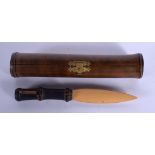 AN UNUSUAL CONTINENTAL BAMBOO CASED KNIFE. 19 cm long.