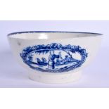 18th c. Liverpool bowl decorated in blue with an oriental figure holding a bird by a fence in a ova