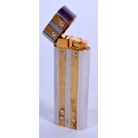 A FRENCH CARTIER TWO TONE LIGHTER. 7 cm x 2.5 cm.