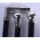 THREE ANTIQUE SILVER TOPPED WALKING CANES. 90 cm long. (3)