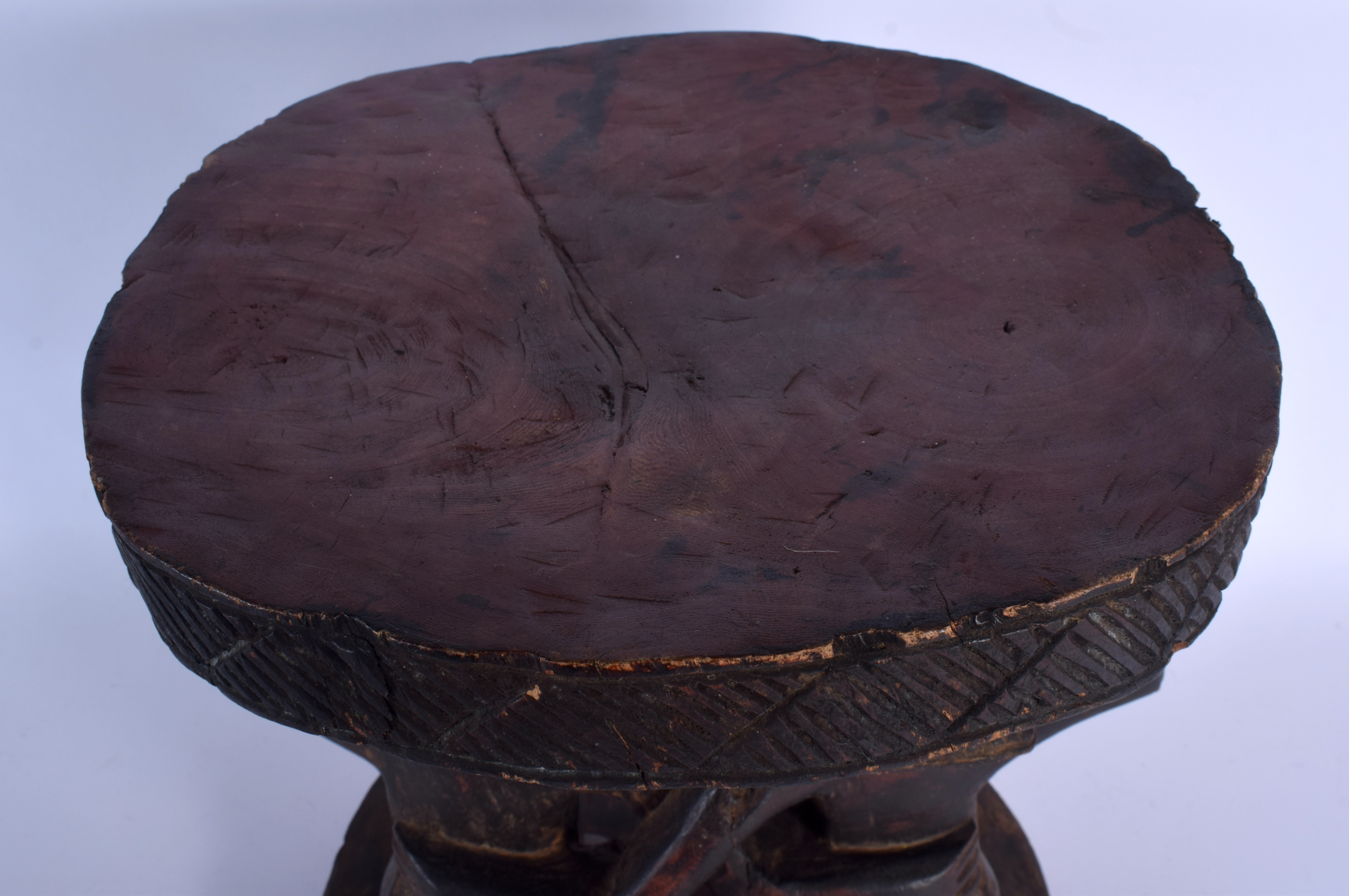 AN UNUSUAL AFRICAN CARVED TRIBAL YORUBA STOOL formed as male and female beside each other. 36 cm x 3 - Image 3 of 4