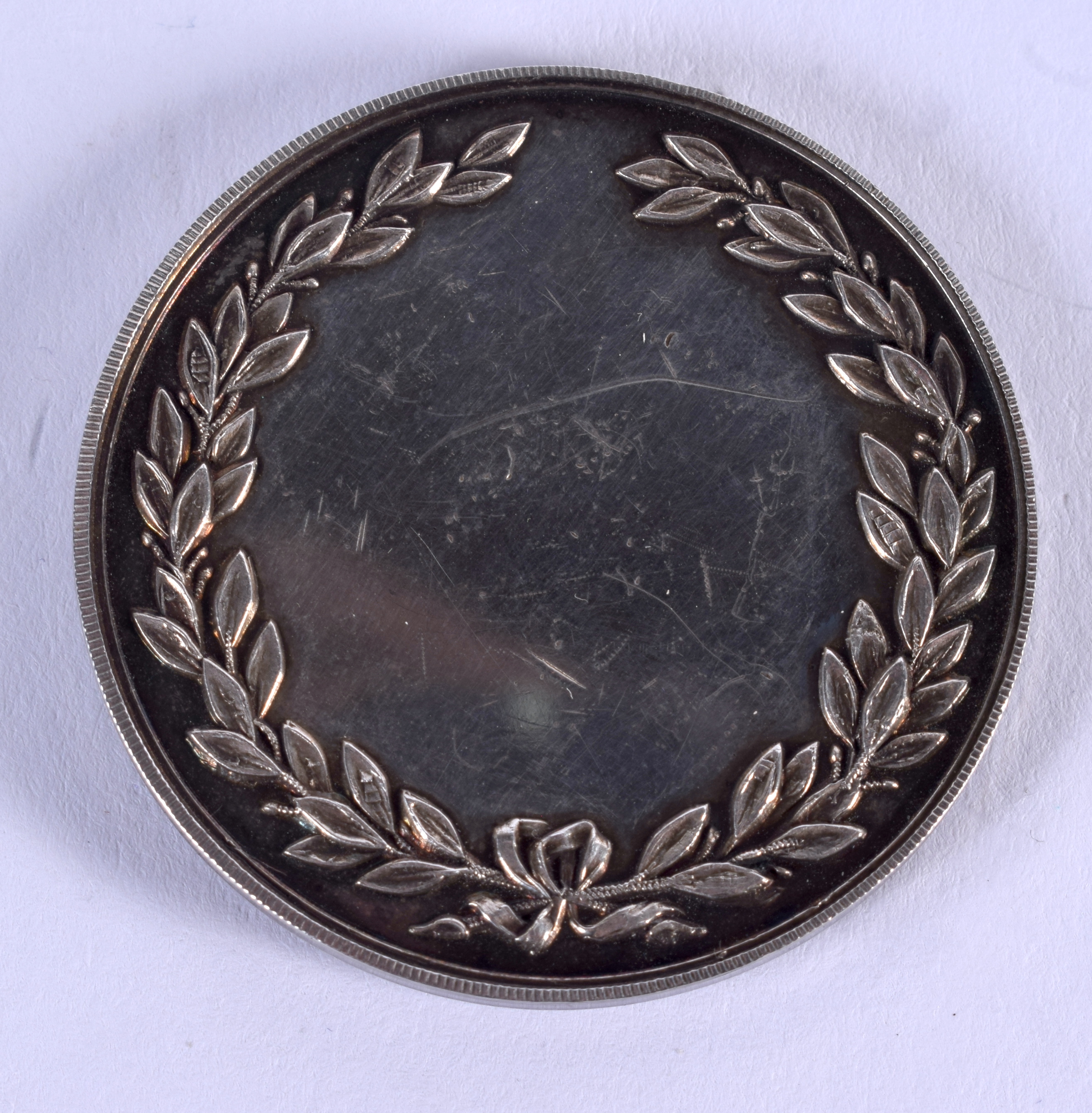 AN ANTIQUE SILVER GAME BIRD MEDALLION. 27 grams. 3.5 cm diameter. - Image 2 of 2