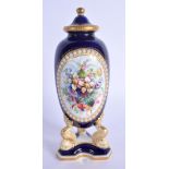 Grainger and co. Worcester blue ground vase and cover painted with flowers in a jewelled panel c.189