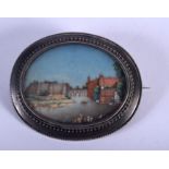 AN ANTIQUE INDIAN SILVER MOUNTED IVORY MINIATURE. 5.5 cm x 4 cm.