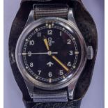 AN OMEGA MILITARY DIRTY DOZEN WRISTWATCH with black dial and yellow tinted numerals. 3.5 cm wide.