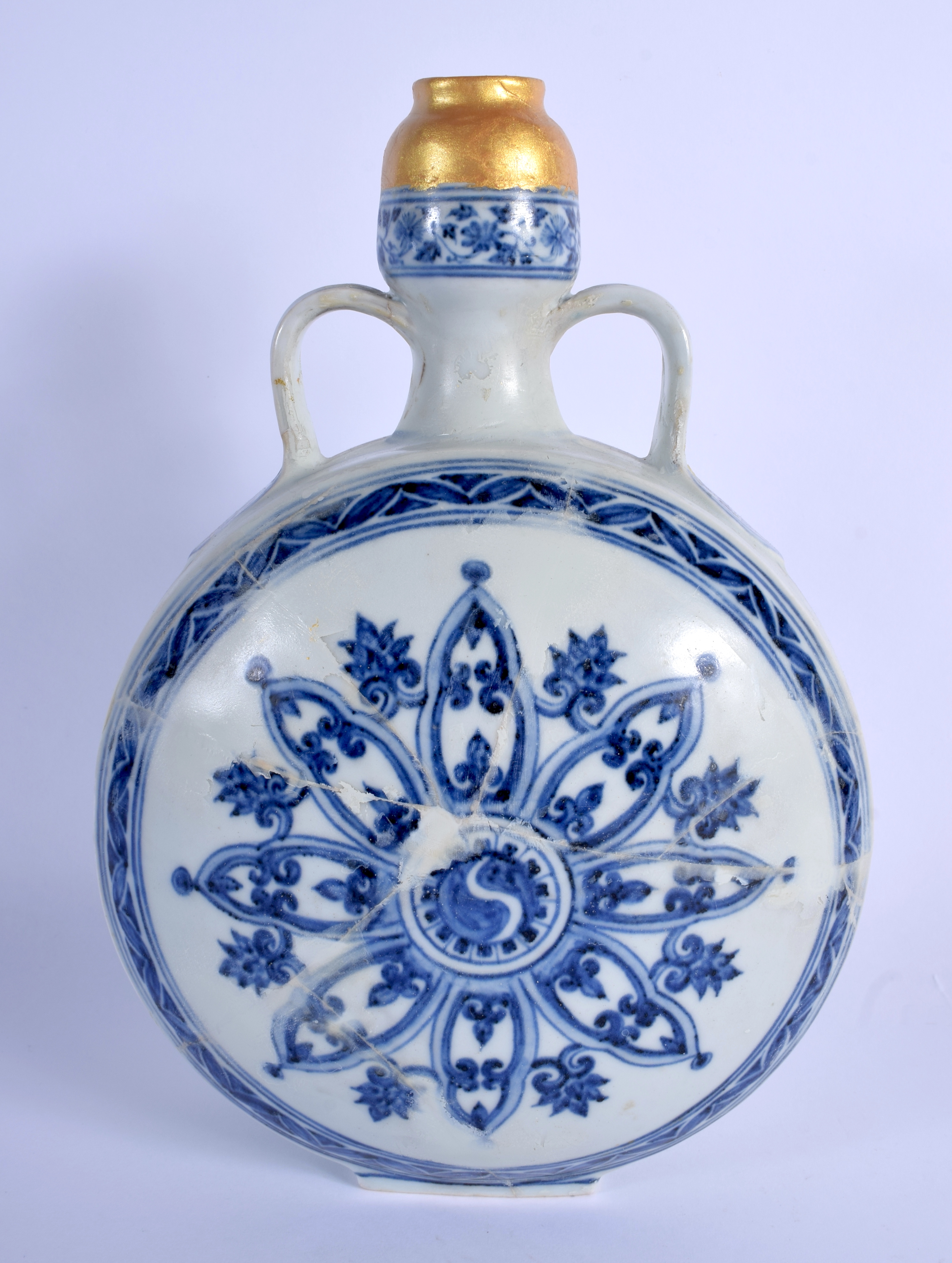 A CHINESE QING DYNASTY TWIN HANDLED BLUE AND WHITE PILGRIM FLASK painted with buddhistic emblems an