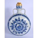 A CHINESE QING DYNASTY TWIN HANDLED BLUE AND WHITE PILGRIM FLASK painted with buddhistic emblems an