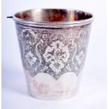 AN ANTIQUE PERSIAN SILVER BEAKER. 56 grams. 5 cm x 5 cm.