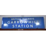 A large enamelled metal British railways sign of Garrowhill station 246 x 72 cm