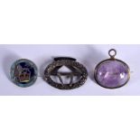 THREE ANTIQUE BROOCHES. Largest 3.5 cm wide. (3)