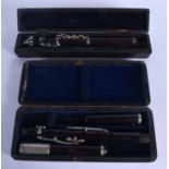 TWO VINTAGE BOXED CLARINETS. (2)