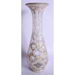 A 19TH CENTURY BOHEMIAN WHITE OVERLAID VASE painted with gilt and foliage. 32 cm high.