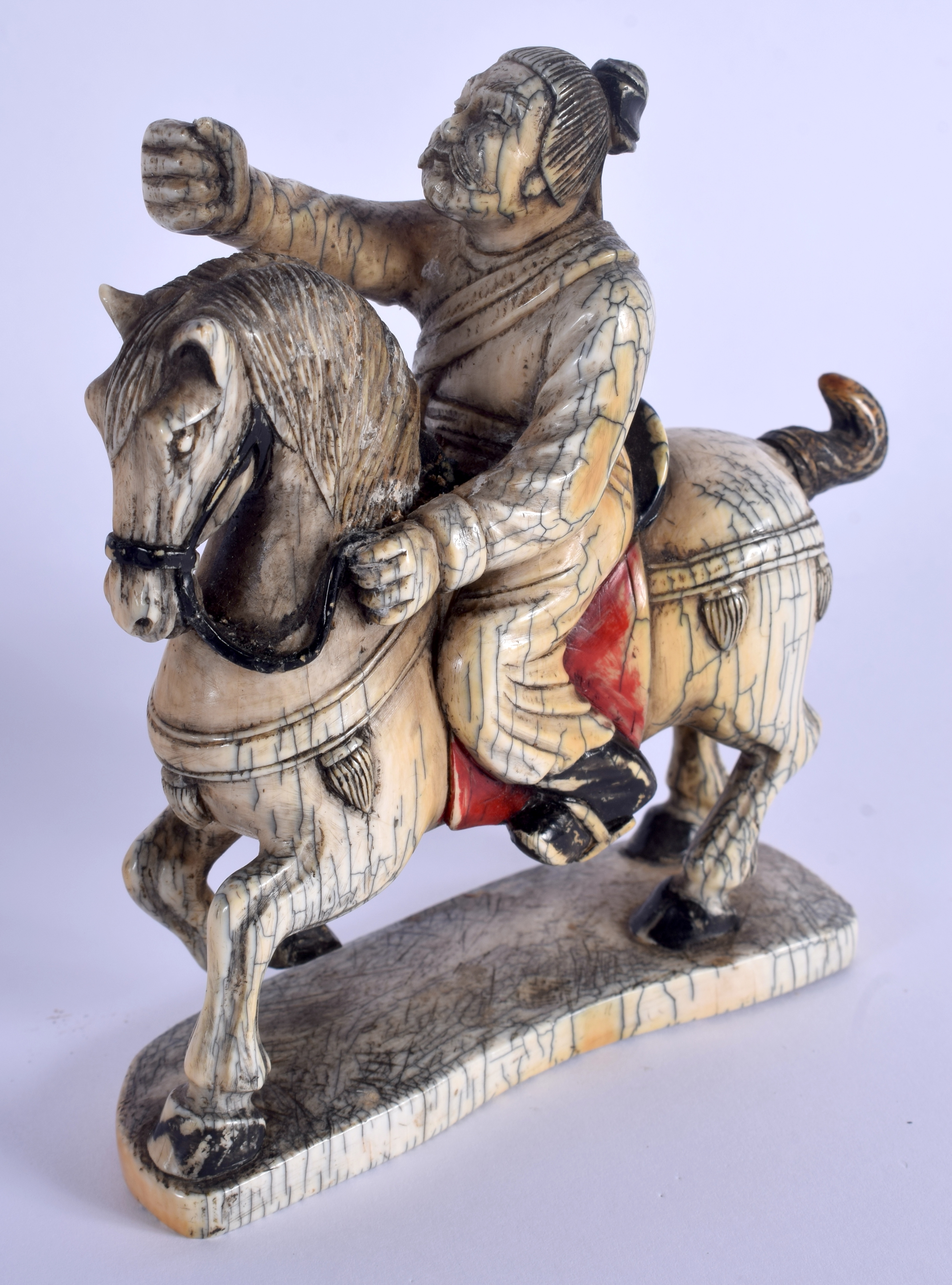 A 19TH CENTURY CHINESE CARVED PAINTED IVORY FIGURE OF A HORSE modelled with an attendant. 11 cm x 12