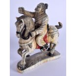 A 19TH CENTURY CHINESE CARVED PAINTED IVORY FIGURE OF A HORSE modelled with an attendant. 11 cm x 12