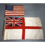 TWO VINTAGE MILITARY FLAGS. Pole 104 cm long. (2)