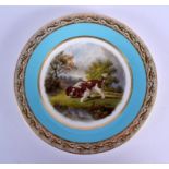 Kerr and Binns Worcester plate painted with a spaniel by Robert F. Perling under a turquoise and gil