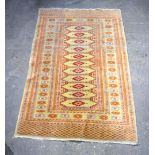 A yellow ground Bokhara Turkman rug 154 x 95cm.
