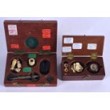 TWO LOVELY ANTIQUE MINIATURE TREEN BOXES containing miniature artefacts, including a magnifying glas