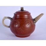 A CHINESE YIXING POTTERY TEAPOT AND COVER 20th Century, with jade handle. 14.5 cm wide.