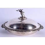 A RARE LARGE ANTIQUE SILVER PLATED TWIN HANDLED SERVING BOWL AND COVER with stag finial. 30 cm wide.