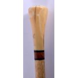 A GEORGE III IVORY AND BONE WALKING CANE. 85 cm long.