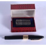 A SILVER NIELLO BOTTLE and a 14ct gold capped pen. (2)
