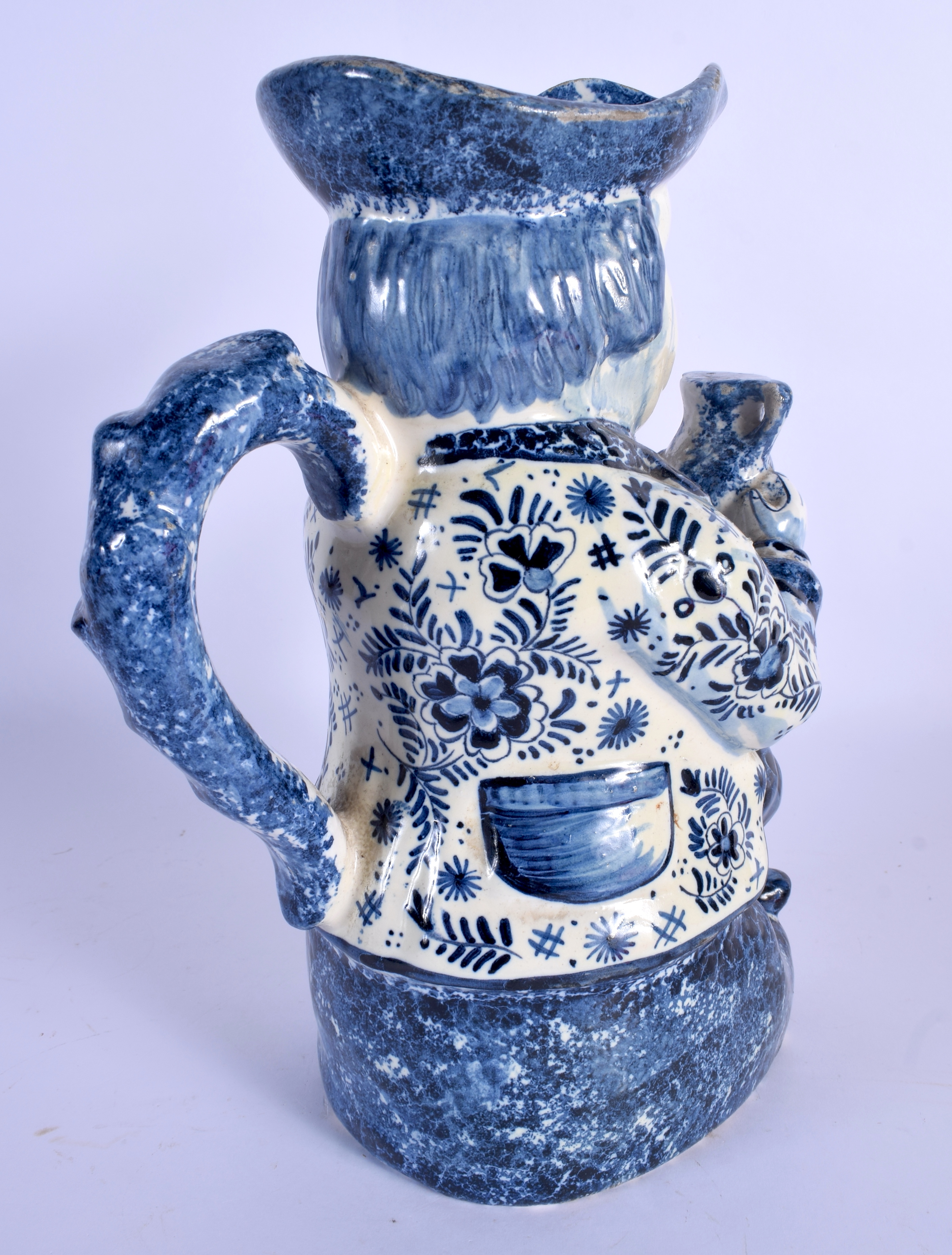 AN ANTIQUE DUTCH BLUE AND WHITE DELFT POTTERY TOBY JUG modelled as a male holding an ale jug. 27 cm - Image 2 of 3